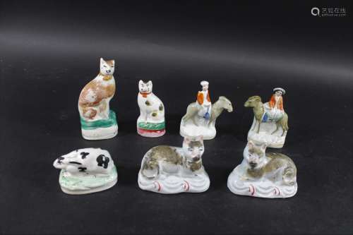 STAFFORDSHIRE ANIMAL FIGURES including a pair of Staffordshi...