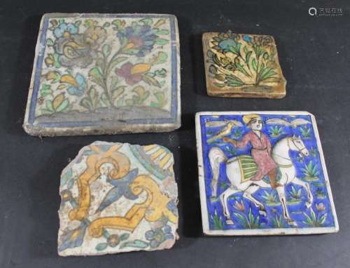PERSIAN TILES including a Qajar style tile, painted with a f...