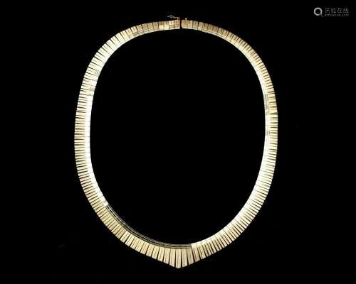 A 14 karat gold lamella necklace