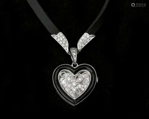 An 18 karat white gold openwork heart-shaped floral decorate...