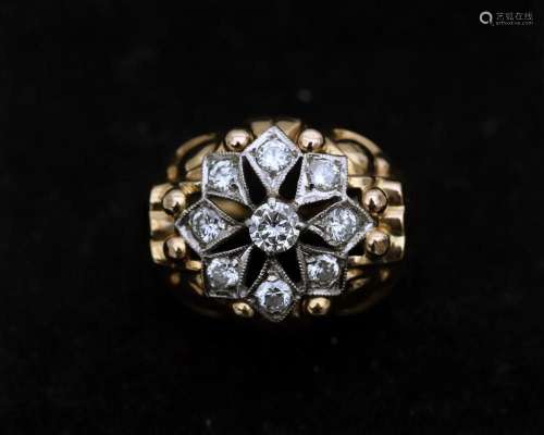 An 18 karat gold cluster ring set with diamonds approx 0.78 ...