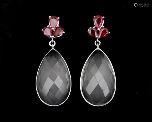 A pair of 14 karat white gold earrings set with rose quartz ...