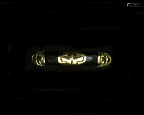 A 14 karat gold Hidalgo ring with black enamel