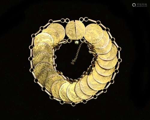 An 18 karat gold coin bracelet possibly Arabic