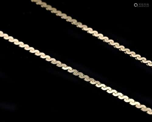 A 14 karat. gold S chain length necklace