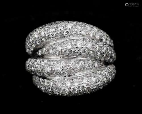 An 18 karat white gold lane ring, set with Diamonds, approx....