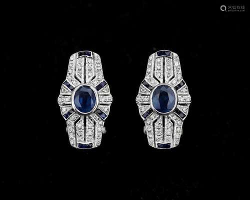 A pair of 14 karat white gold earrings, after ArtDeco model,...