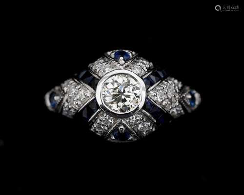 A 14 karat white gold ring set with a bolshevik cut diamond ...