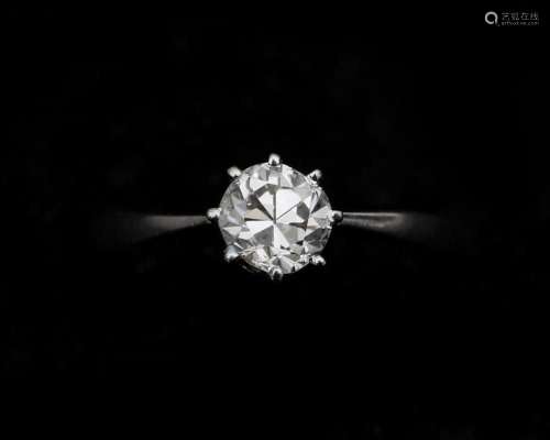 A 14 karat white gold solitaire ring, set with an old cut di...