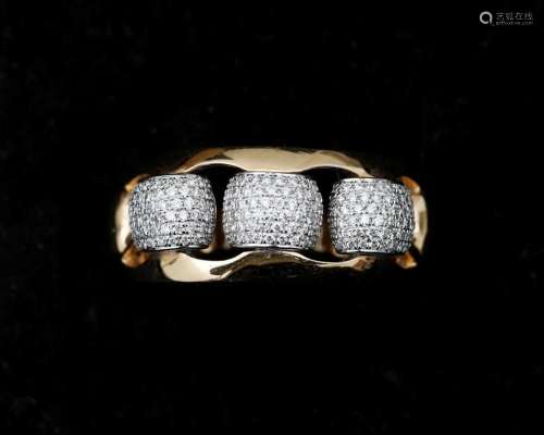 An 18 karat bicolor wide gold band ring, set with diamonds