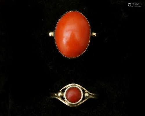 Two rings 14 krt. gold with red coral.