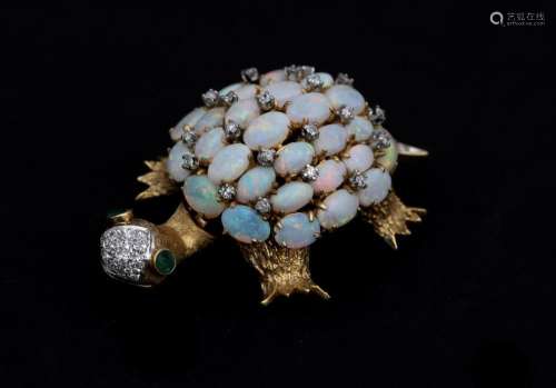 A gold pendant/brooch in the shape of a turtle, set with Opa...