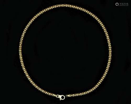 A 14 karat. gold "popcorn" link necklace.