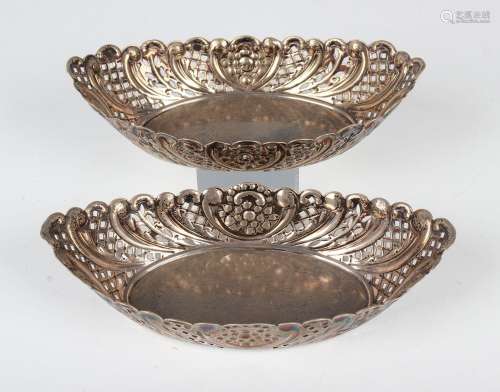 A pair of late Victorian silver boat shaped bowls, each with...