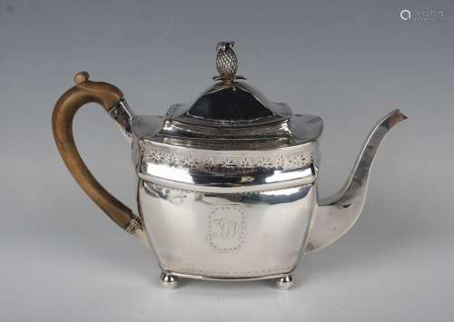 A George III silver cushion shaped teapot, the hinged lid wi...