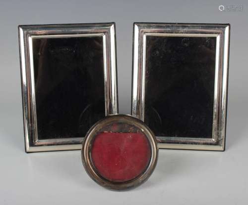 A pair of .925 silver mounted rectangular photograph frames,...