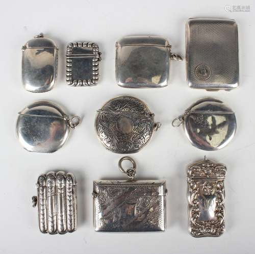 An Edwardian silver vesta case in the form of a four-section...