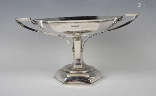 A George V silver tazza, the hexagonal bowl flanked by outsw...