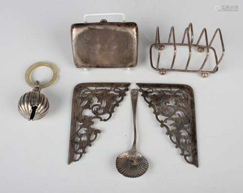 An Edwardian silver four-division toast rack, Sheffield 1904...