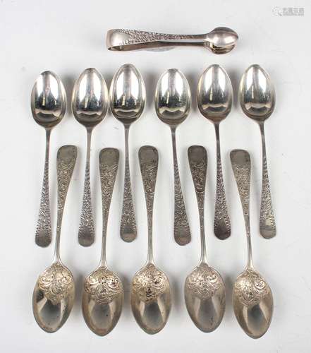 A set of six Edwardian silver teaspoons with engraved handle...