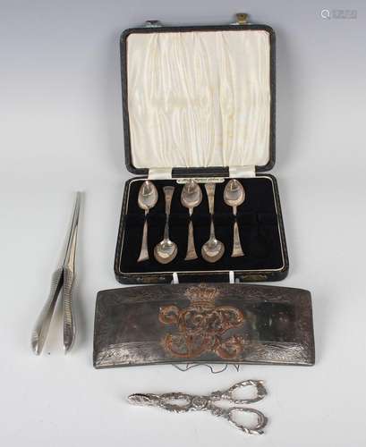 A group of silver items, comprising a pair of Victorian suga...