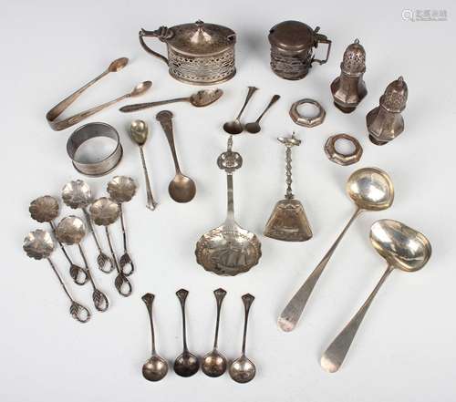 A group of silver items, including a sauce ladle, London 190...