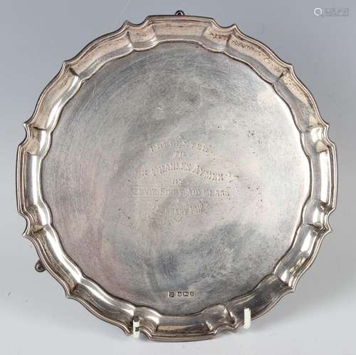 A George V silver circular card salver, presentation inscrib...