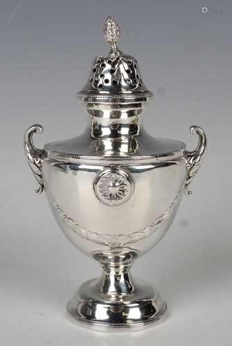 A George V Irish silver sugar caster of urn form with pierce...