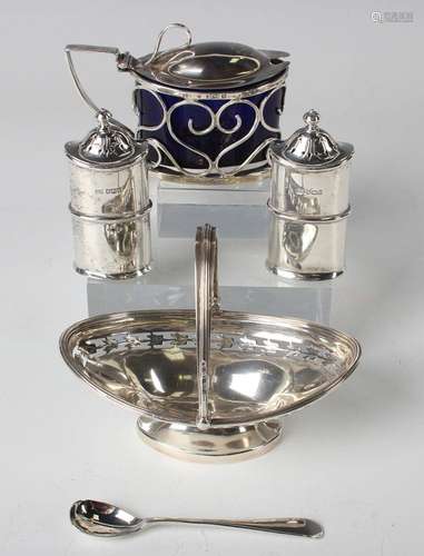 A George V silver boat shaped bonbon basket with reeded swin...