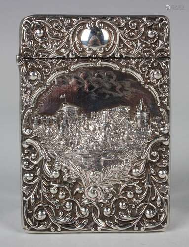 An Edwardian silver castle-top card case of rectangular form...