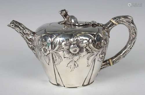 An early Victorian silver circular teapot, the hinged lid wi...