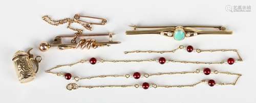 A gold, turquoise and seed pearl bar brooch, collet set with...