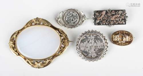 A group of mostly Victorian brooches, comprising an oval gol...