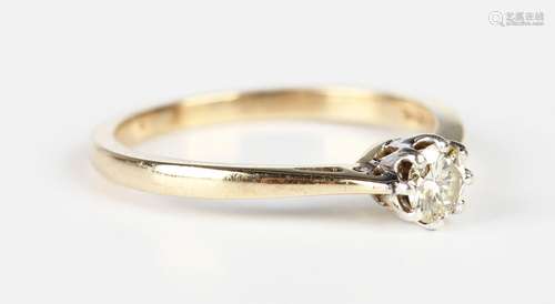 A 9ct gold and diamond single stone ring, claw set with a ci...