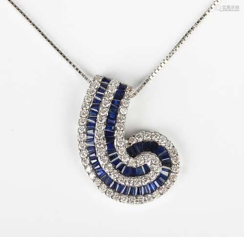 A white gold, sapphire and diamond pendant in a scroll desig...