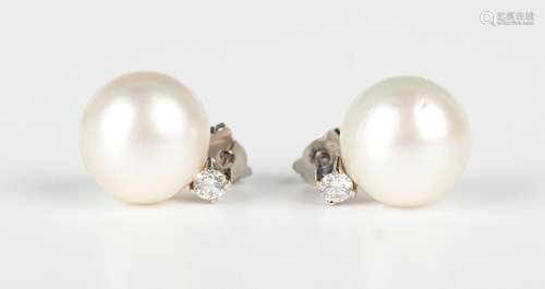 A pair of platinum, diamond and South Sea cultured pearl ear...