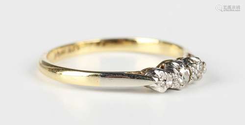 A gold, platinum and diamond three stone ring, mounted with ...