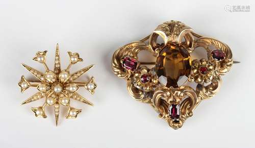 A Victorian gold, citrine, garnet and red gem set brooch in ...