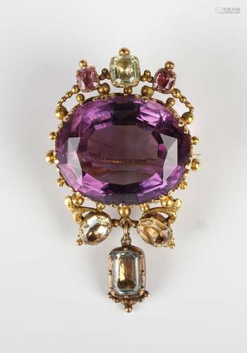 A Victorian gold, amethyst and foil backed varicoloured gem ...