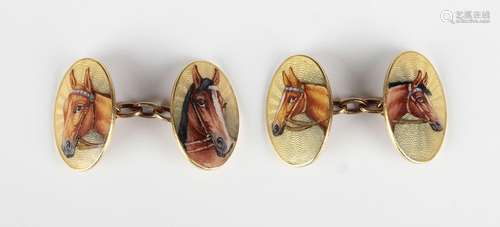 A pair of gold and enamelled oval cufflinks, each front enam...