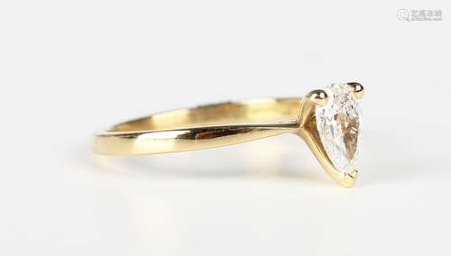 An 18ct gold and diamond single stone ring, claw set with th...