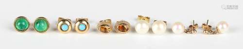 A pair of 9ct gold and citrine oval earstuds, a pair of 9ct ...