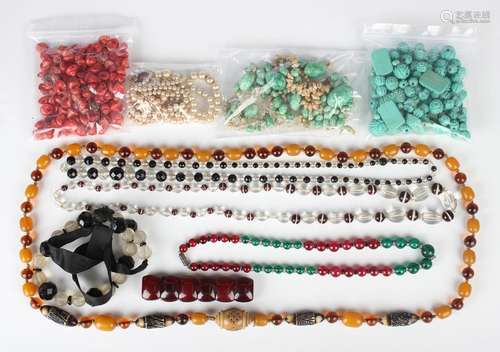 A quantity of necklaces and loose beads, including coral, sh...