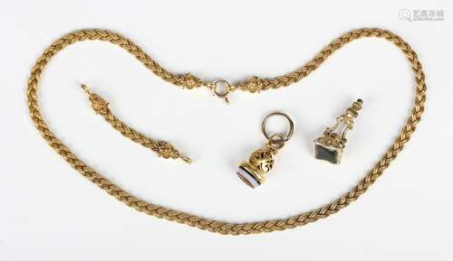 A Victorian gold neckchain in a plaited interwoven design, u...