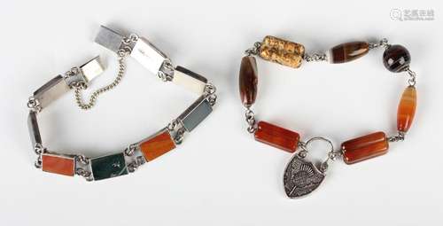 A varicoloured agate bracelet on a shield shaped padlock cla...