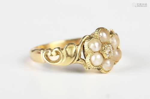 A Victorian gold, diamond and seed pearl cluster ring in a f...