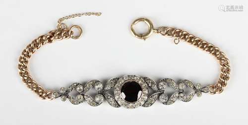 A gold, silver, garnet and colourless paste bracelet, the fr...