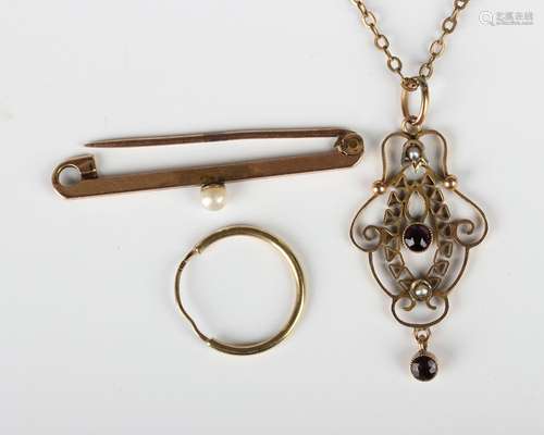 An Edwardian gold, amethyst and half-pearl pendant in an ope...