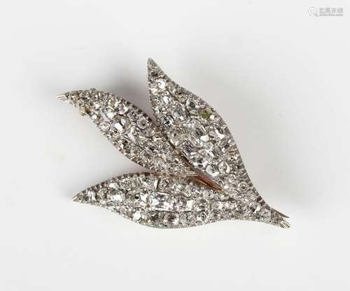 A Victorian diamond brooch in a triple leaf design, mounted ...