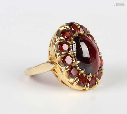 A 9ct gold, carbuncle garnet and garnet large oval cluster r...